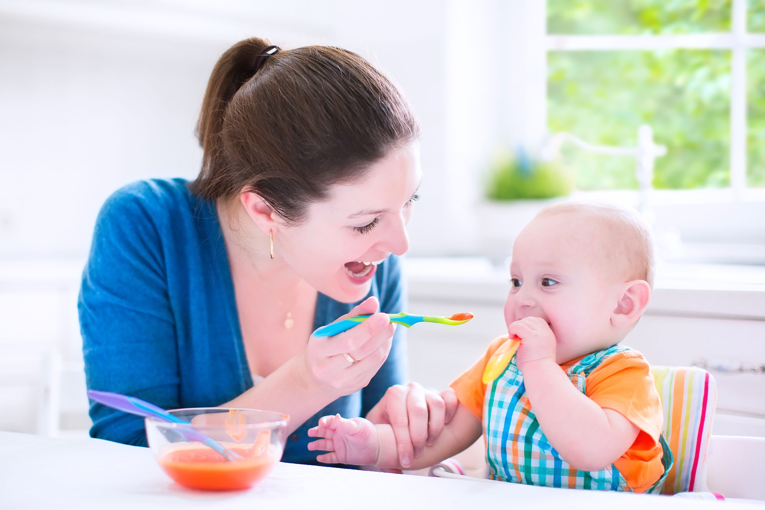 Mother Feeds Baby Food Picture And HD Photos